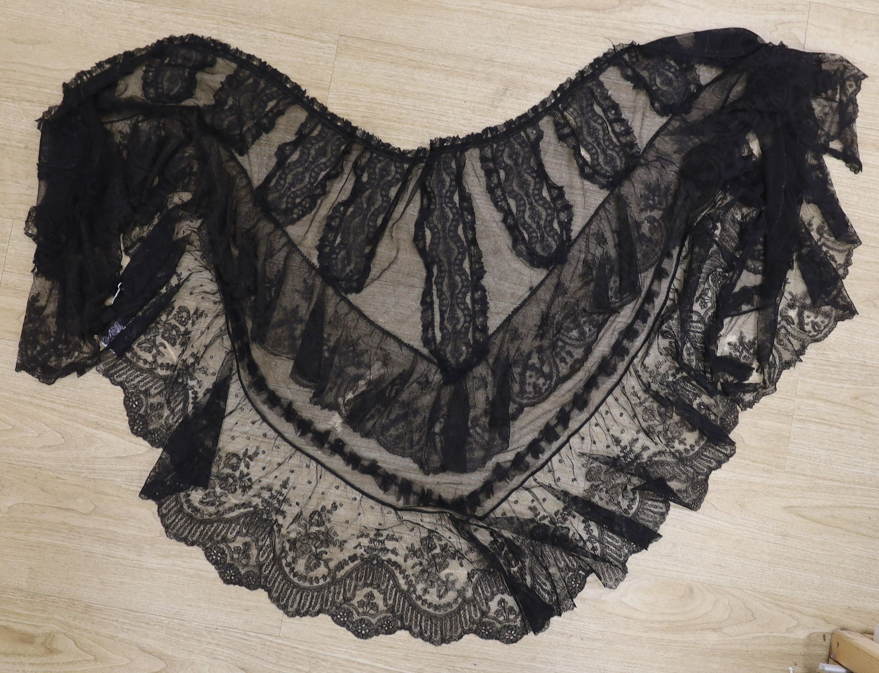 A black lace Chantilly handmade bertha